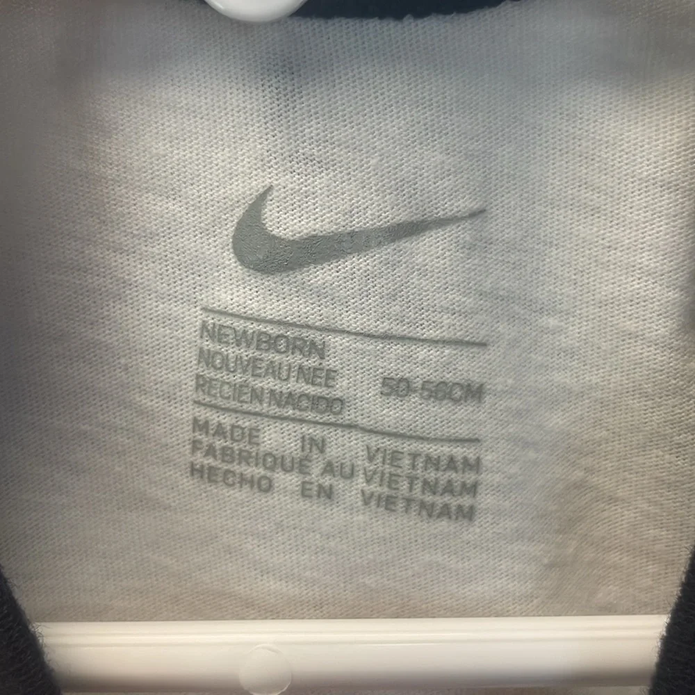 Nike White and Black 'Just‎ Do It' Baby onesie